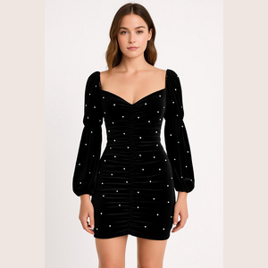 23. a Peach Black Dress with Pearl Accents